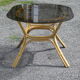Table rattan and smoked glass 70s