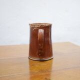 Vintage pitcher in glazed terracotta