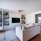 Beige linen sofa and armchair with stain-resistant treatment