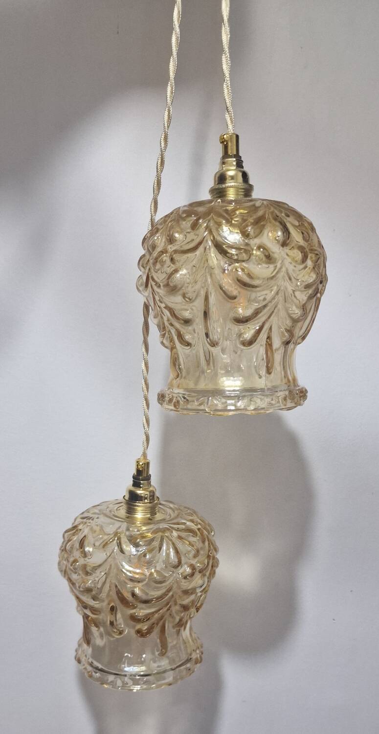 Duo of amber molded glass portable lamps