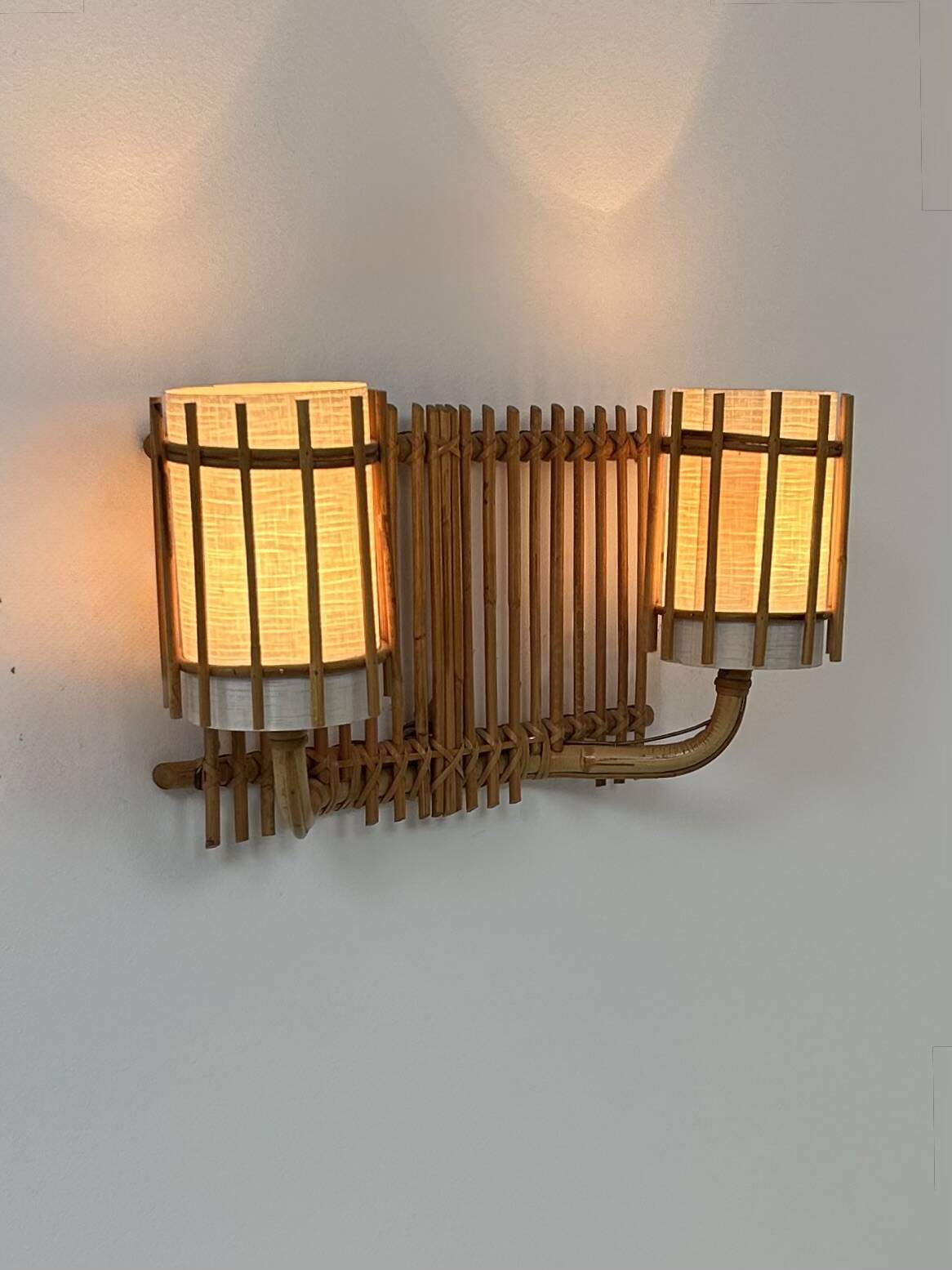 Double vintage wall light in rattan, France, 1950.