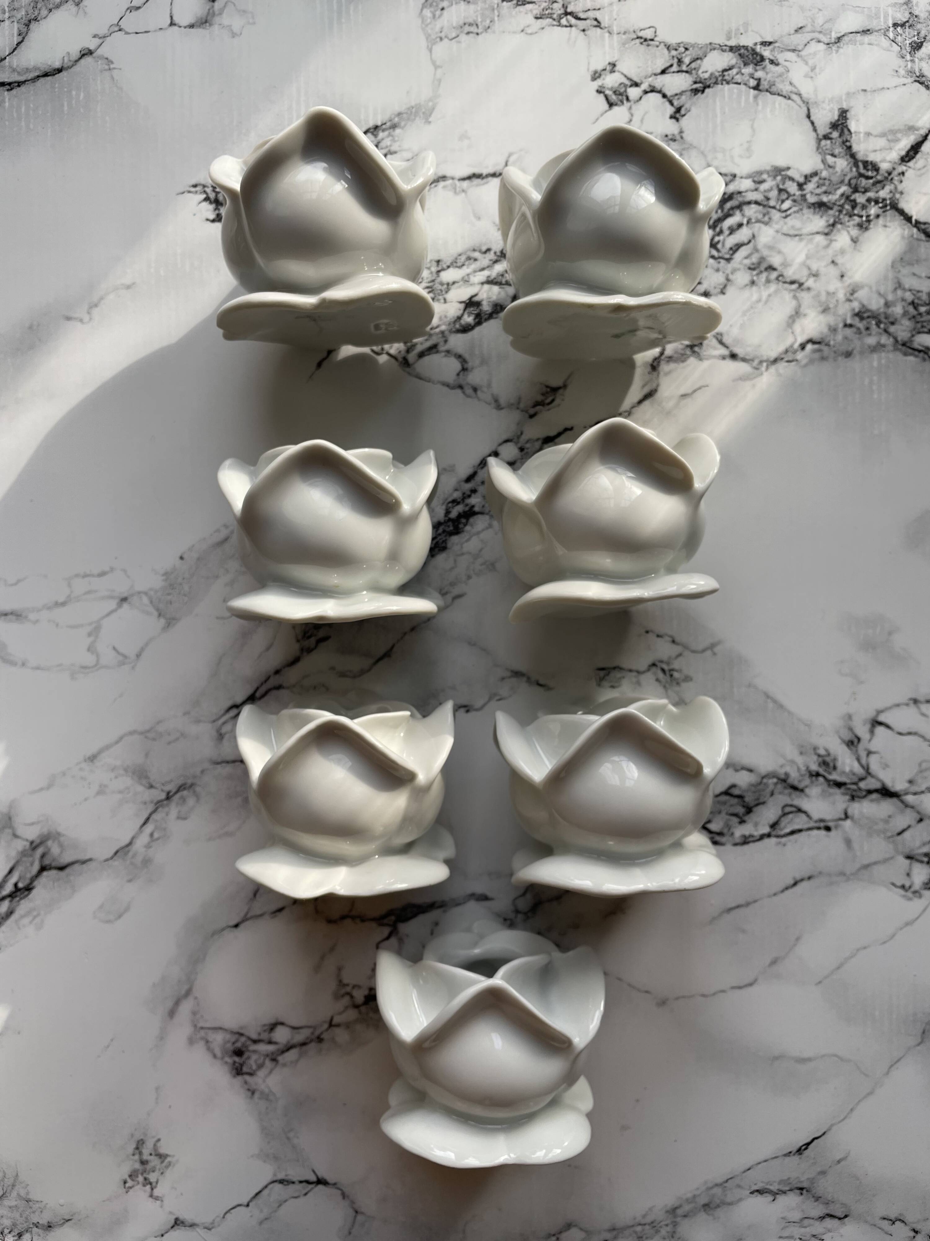 White porcelain rose shaped candle holders