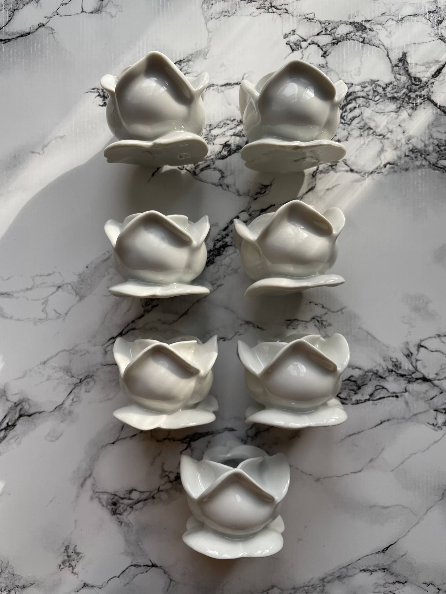 White porcelain rose shaped candle holders