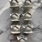 White porcelain rose shaped candle holders