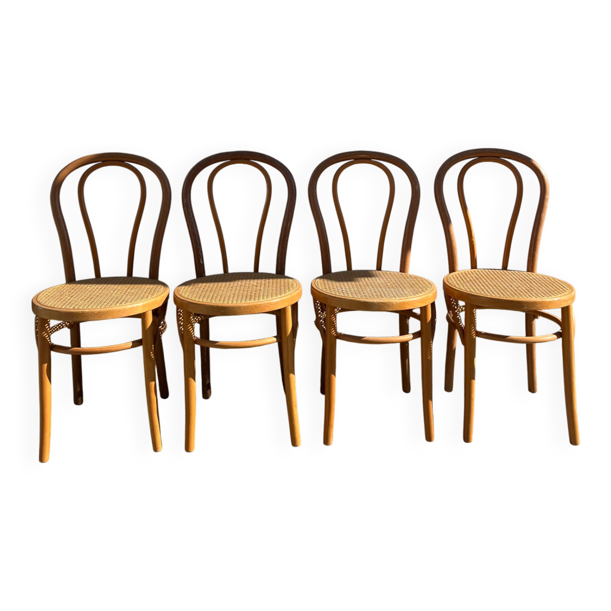 Set of 4 bentwood bistro chairs with caning.