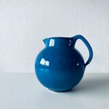 Old pitcher in glazed stoneware