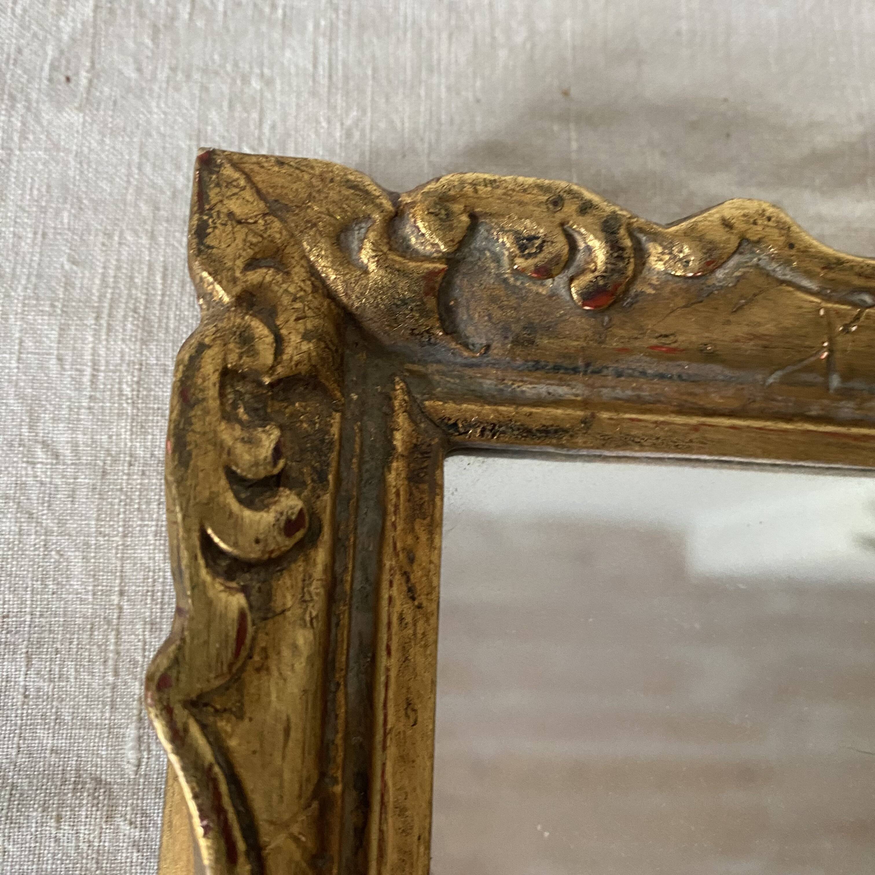 Small molded gilded mirror