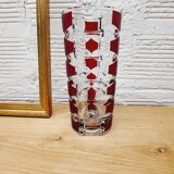 Glass vase with colored facets