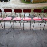 6 red and chrome Formica chairs