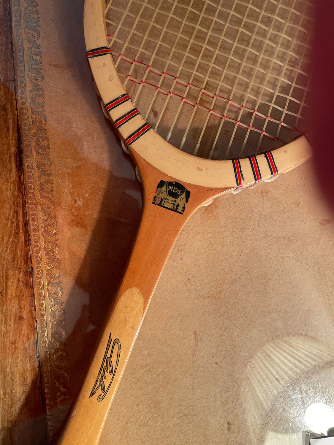 Vintage blond wood tennis racket