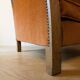 Art Deco club armchair in wood and rust brown velvet, circa 1930.