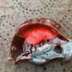 Empty pocket in glazed ceramic slip in the shape of vintage fish