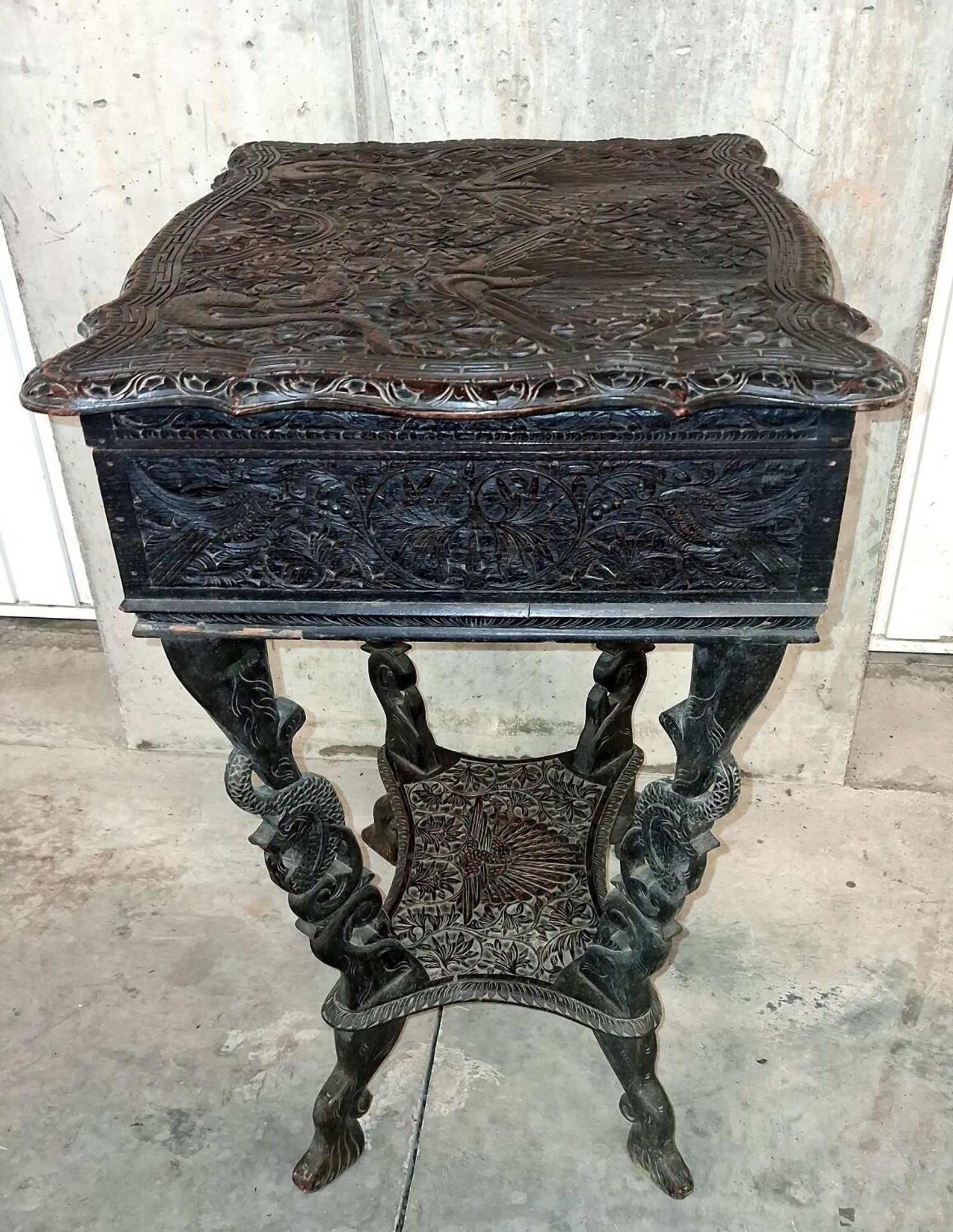 Ethnic carved wooden worker's furniture