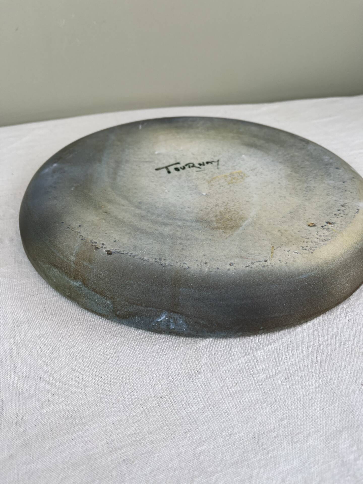 Large enamelled stoneware dish signed Tournay