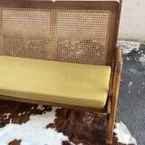 caned teak bench