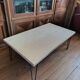Coffee table in solid bamboo with steel legs.