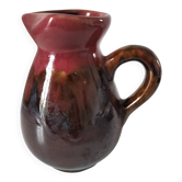 Vintage pitcher in raspberry red and chocolate flamed ceramic.