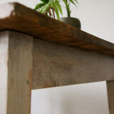 Patinated wooden dining table