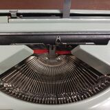 Hermès Baby lime green typewriter with suitcase