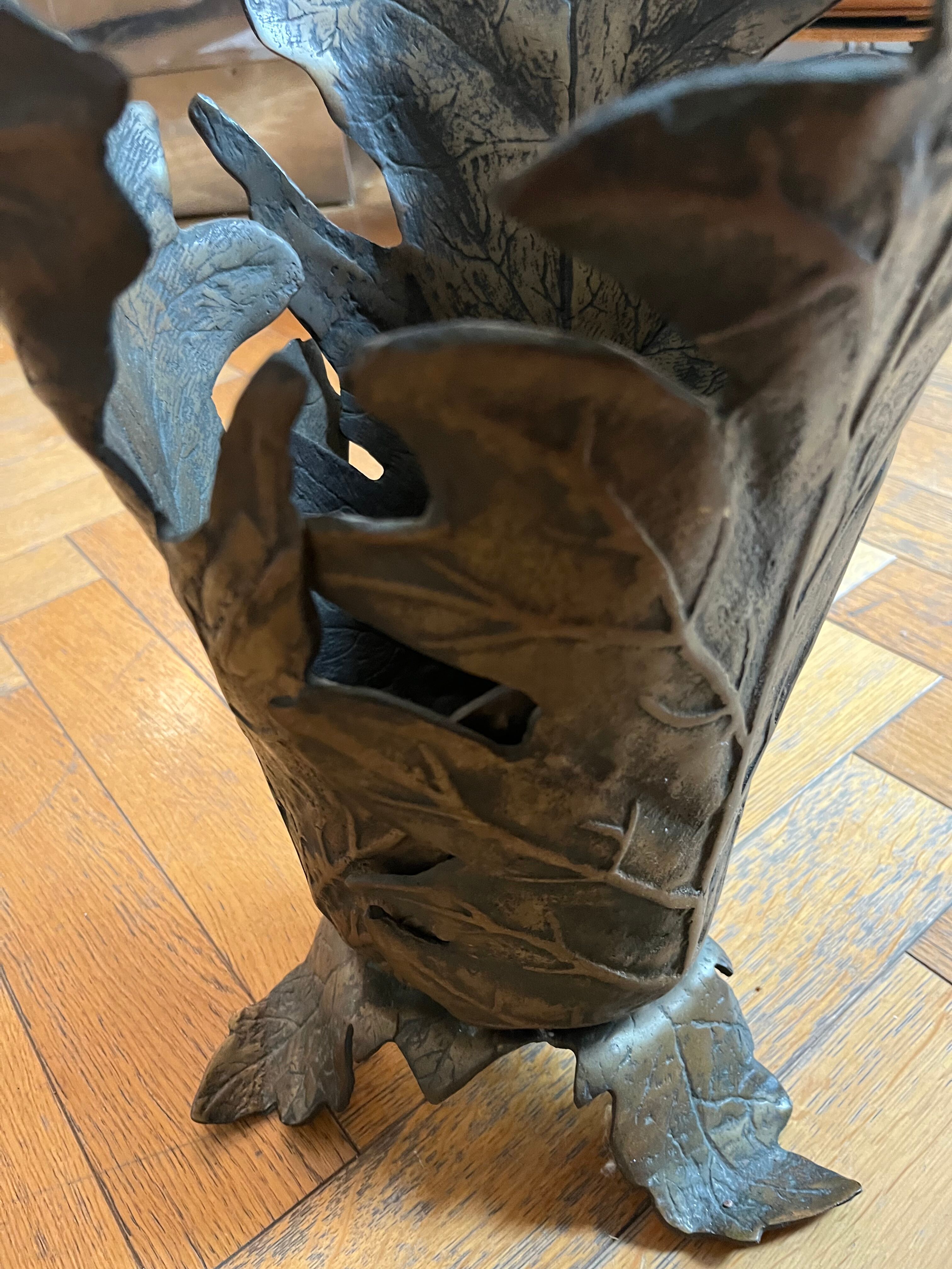 Elegant bronze umbrella door by the famous Italian designer Gabriella Crespi