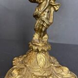 Antique crystal bowl on a bronze stand.