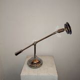 Articulated chromed metal lamp