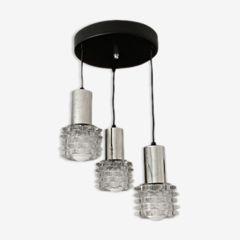 Cascading suspension and Raak Space Age 70 style wall lamps