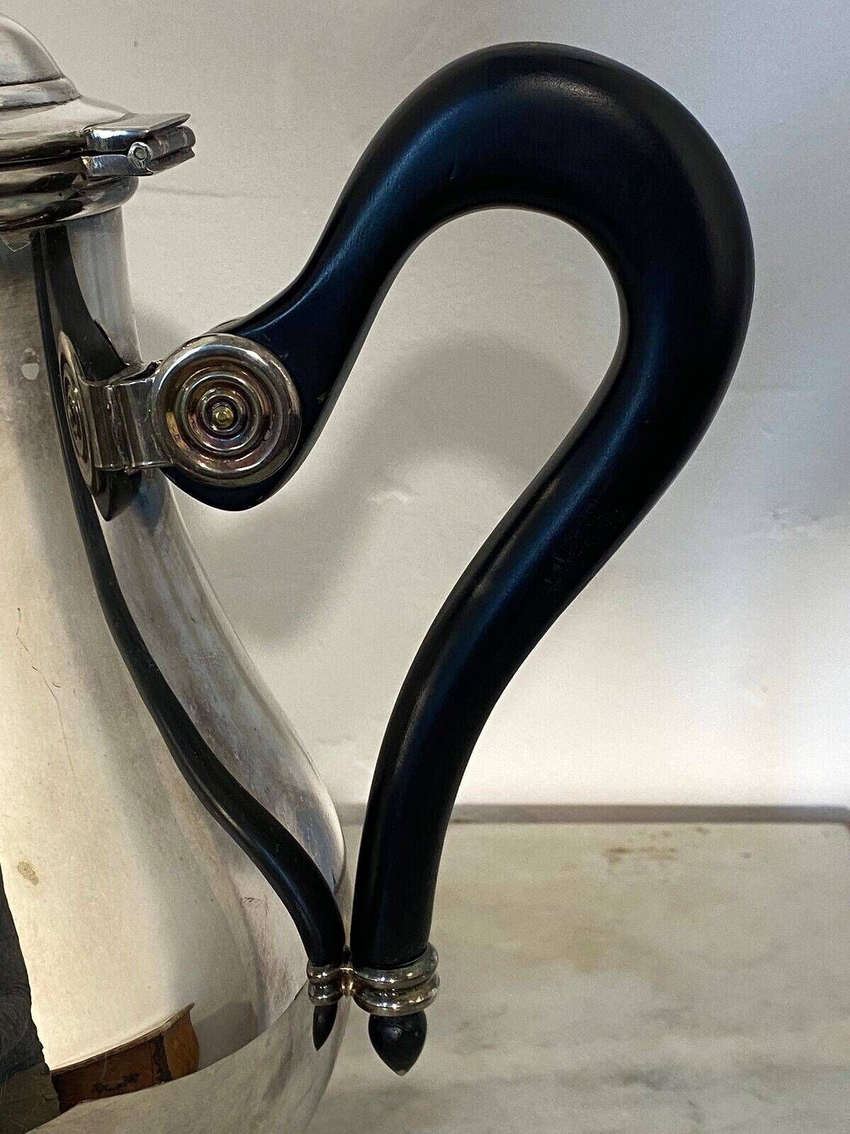 Saint Hilaire teapot in silver-plated metal, with a blackened handle.