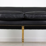Black leather club sofa