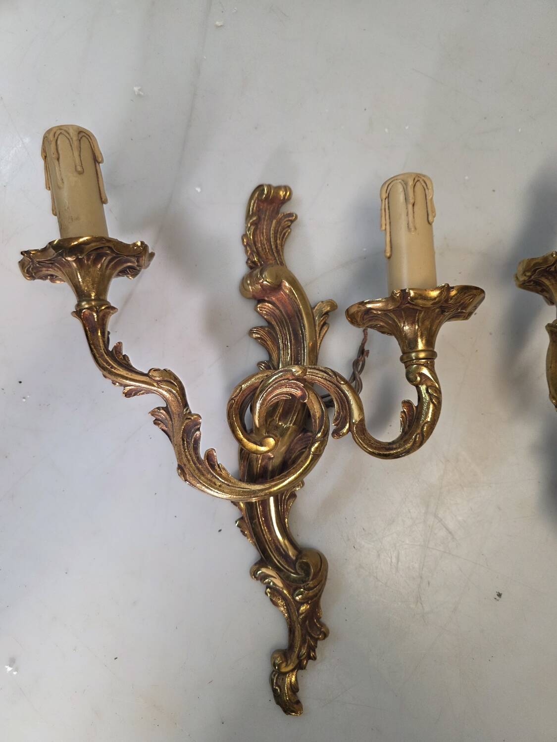 Pair of Louis XV style bronze wall sconces