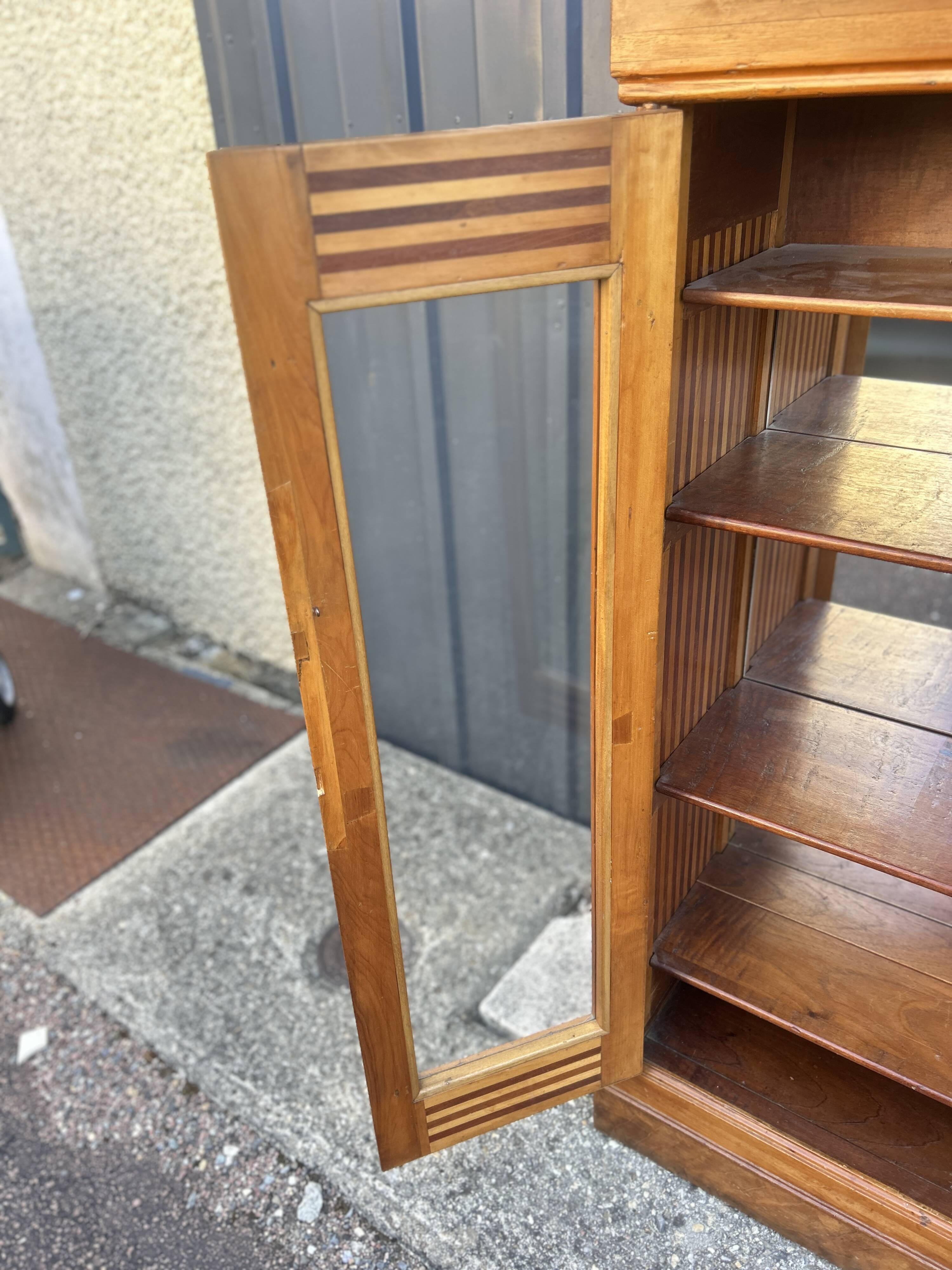 Two-door mahogany display cabinet