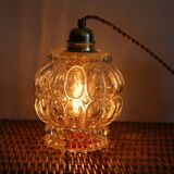 Moulded glass globe hand lamp