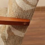 Pair of vintage lounge chairs in brown jacquard fabric and wood.