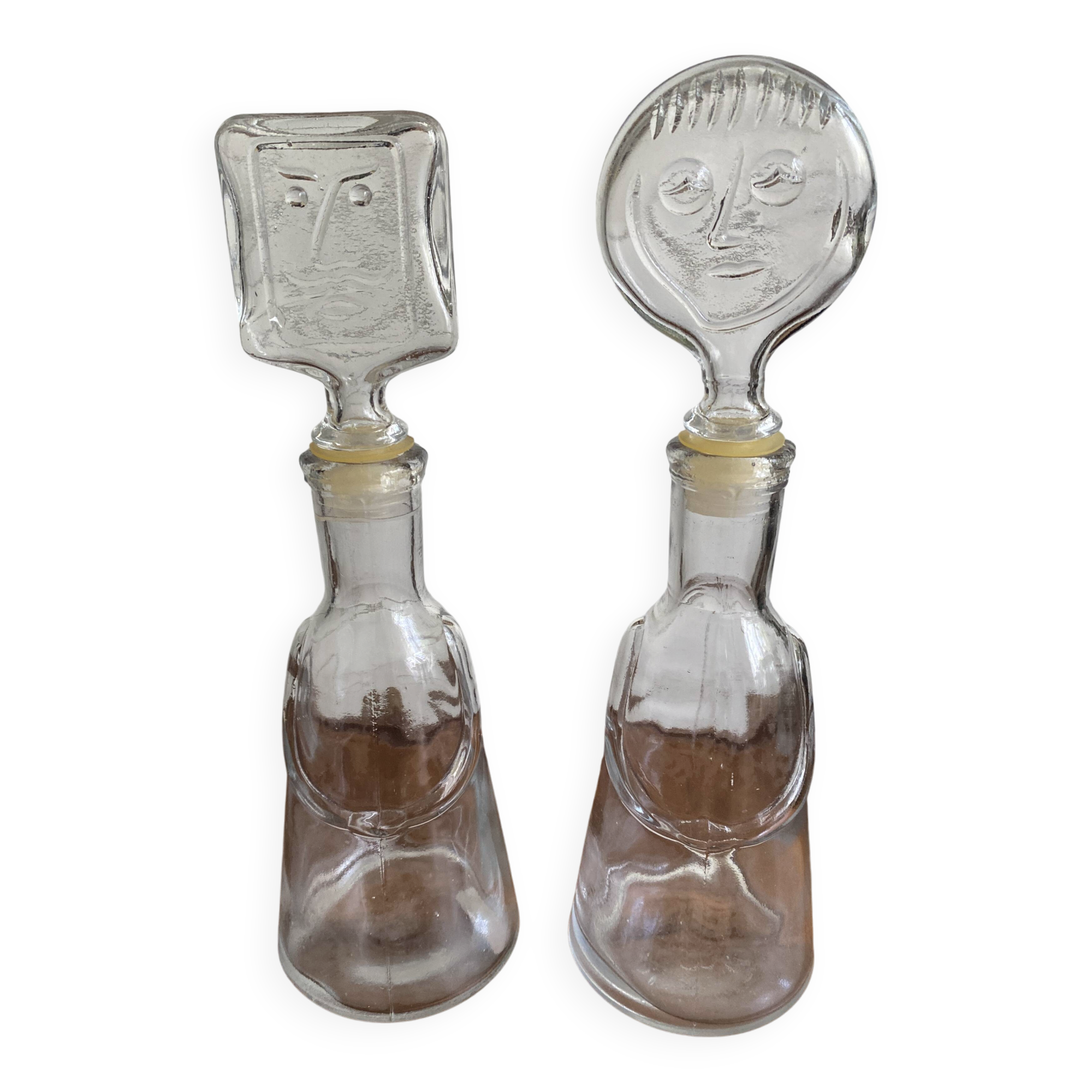 Pair of decanters by Erik Hoglund for Neiman Marcus, "People" series, Kosta Boda