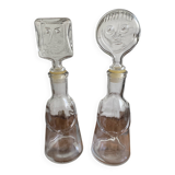 Pair of decanters by Erik Hoglund for Neiman Marcus, "People" series, Kosta Boda