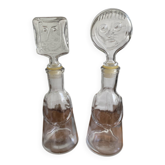 Pair of decanters by Erik Hoglund for Neiman Marcus, "People" series, Kosta Boda
