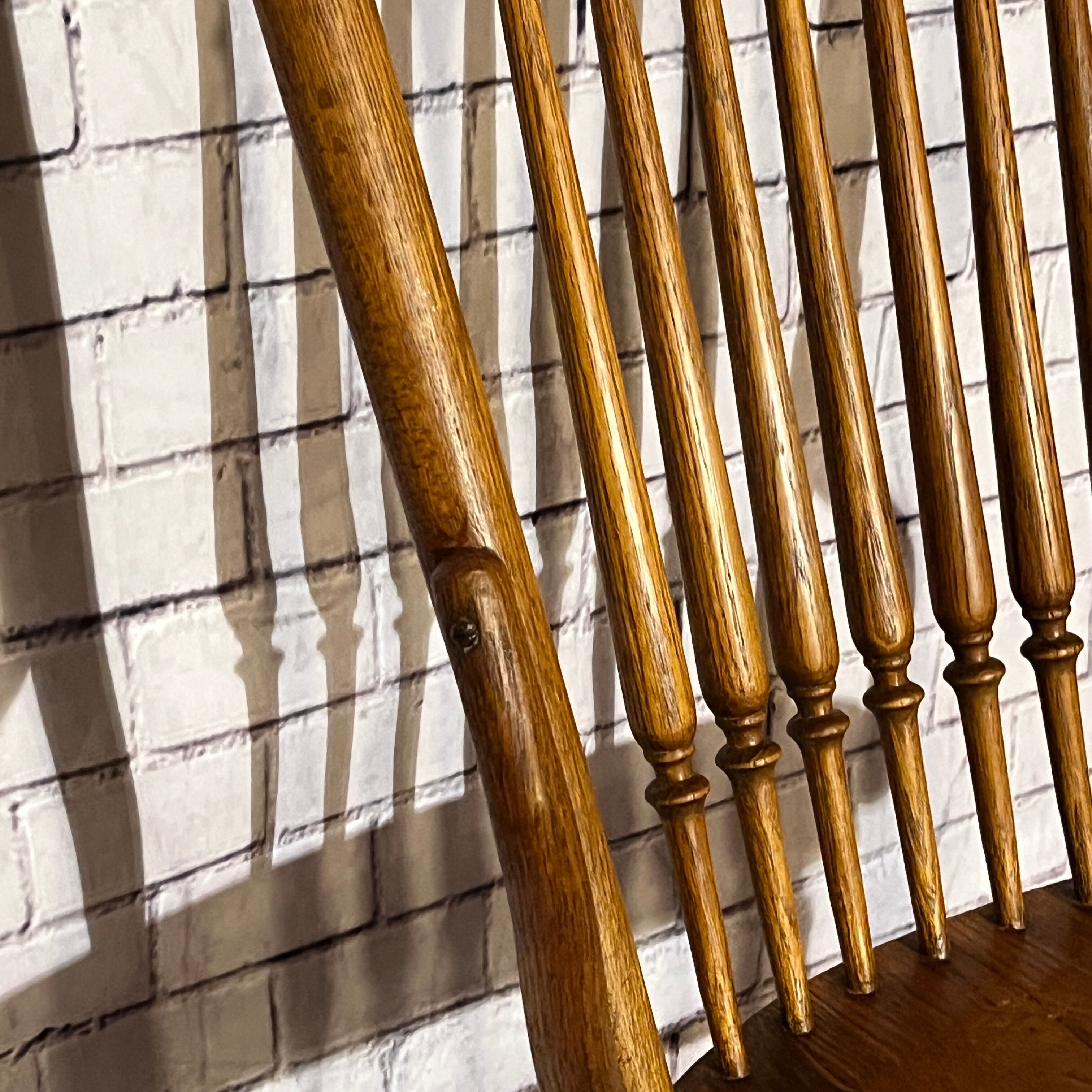 Wooden armchair with high back