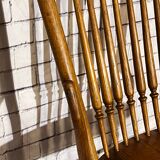 Wooden armchair with high back