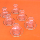 Transparent glass tea service with gilding.