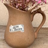 Small ancient sandstone pitcher