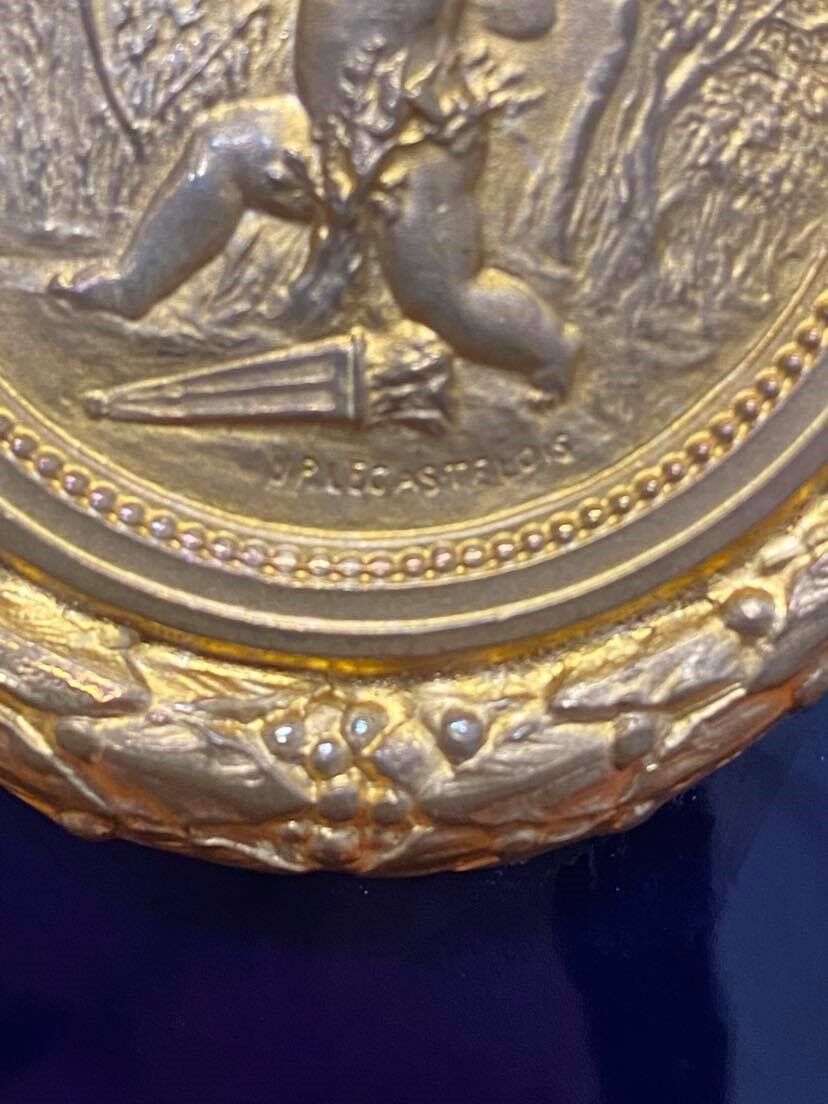Vase signed Legastelois in blue ceramic of Sèvres and gilded bronze