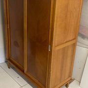 Vintage wardrobe with compass feet, sliding doors
