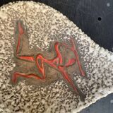 Glassed ceramic cut enamelled prehistoric warrior motif vintage red 1950