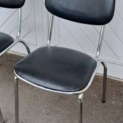 Pair of vintage faux leather and chrome chairs