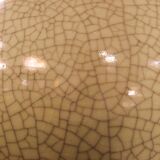 Ceramic lamp with a crackled celadon green finish.