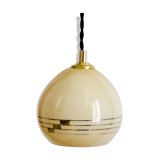 Yellow opaline hand lamp
