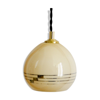 Yellow opaline hand lamp