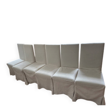 Set of 6 Maxalto chairs with covers.