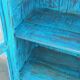 Glass cabinet in old blue wood