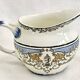 Old cream jug for children at the Dionysos press Gien